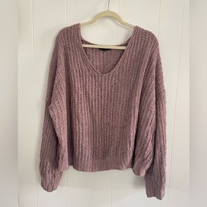 Long purple knitted sweater
